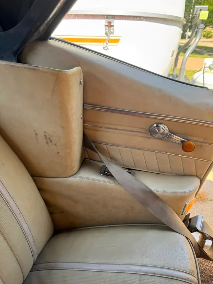 The same passenger seat and door panel after detailing