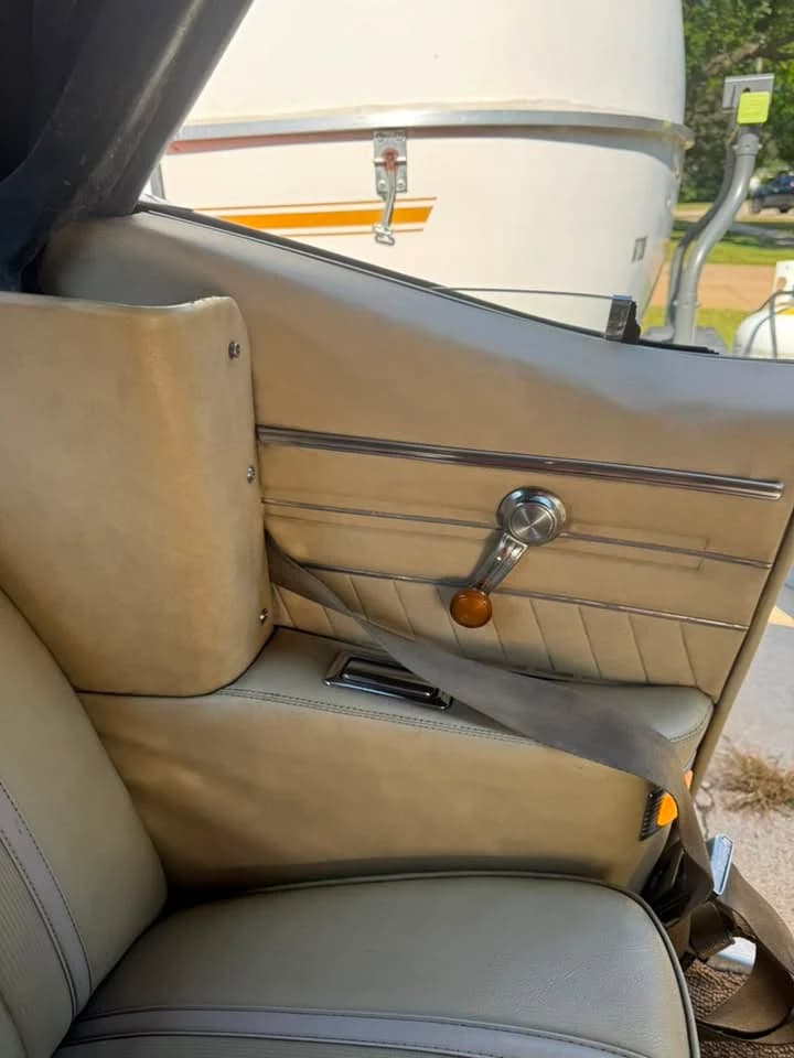 The same passenger seat and door panel after detailing